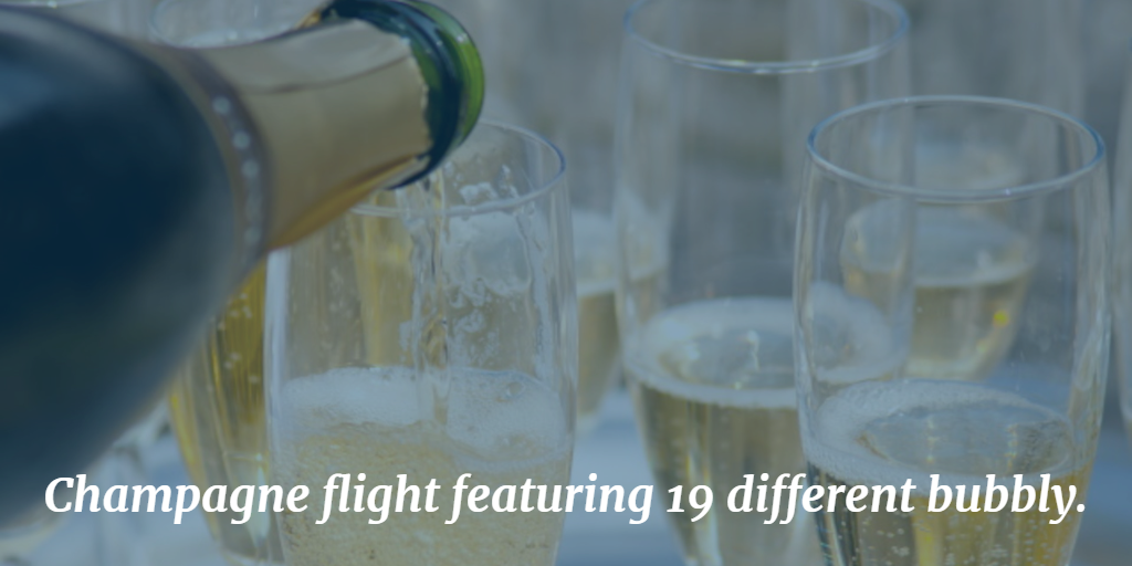 Champagne flight featuring 19 different bubbly